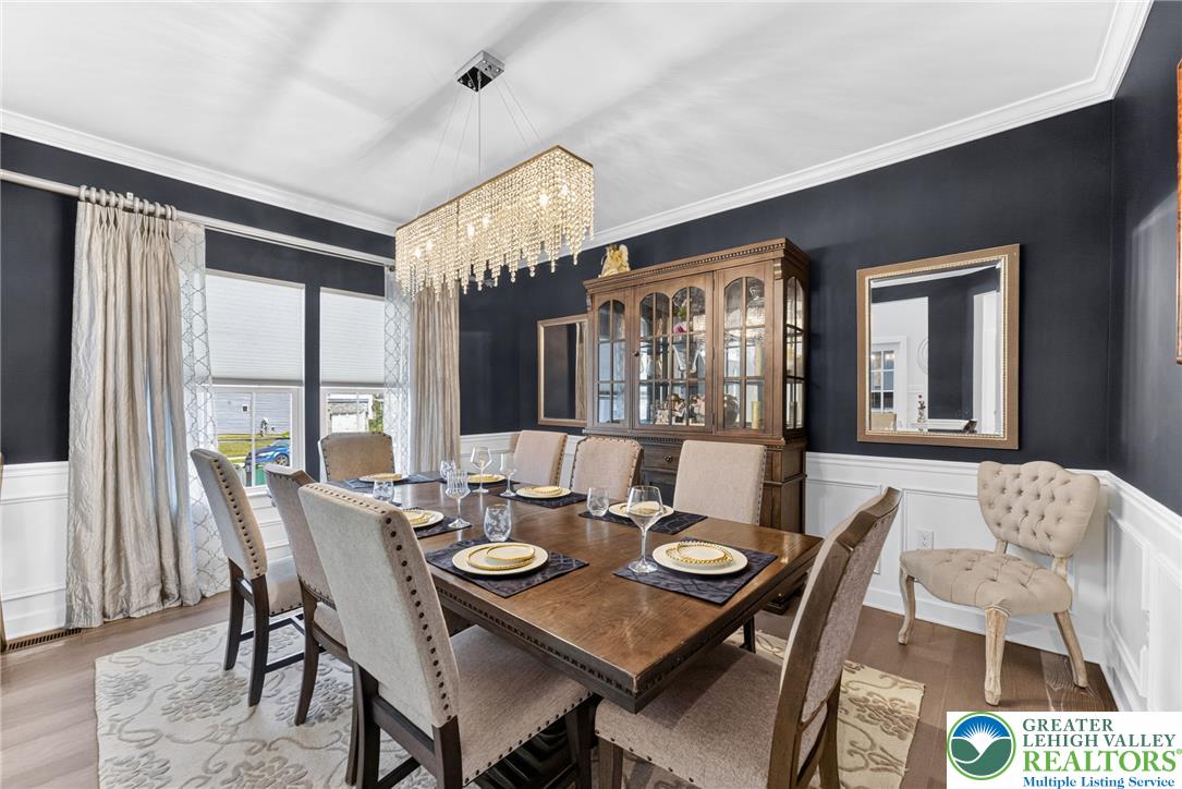 3952 Orth Street Bethlehem, PA 18020 - Photo 9 of 60 A formal dining area provides an elegant space for gatherings under a dazzling chandelier.