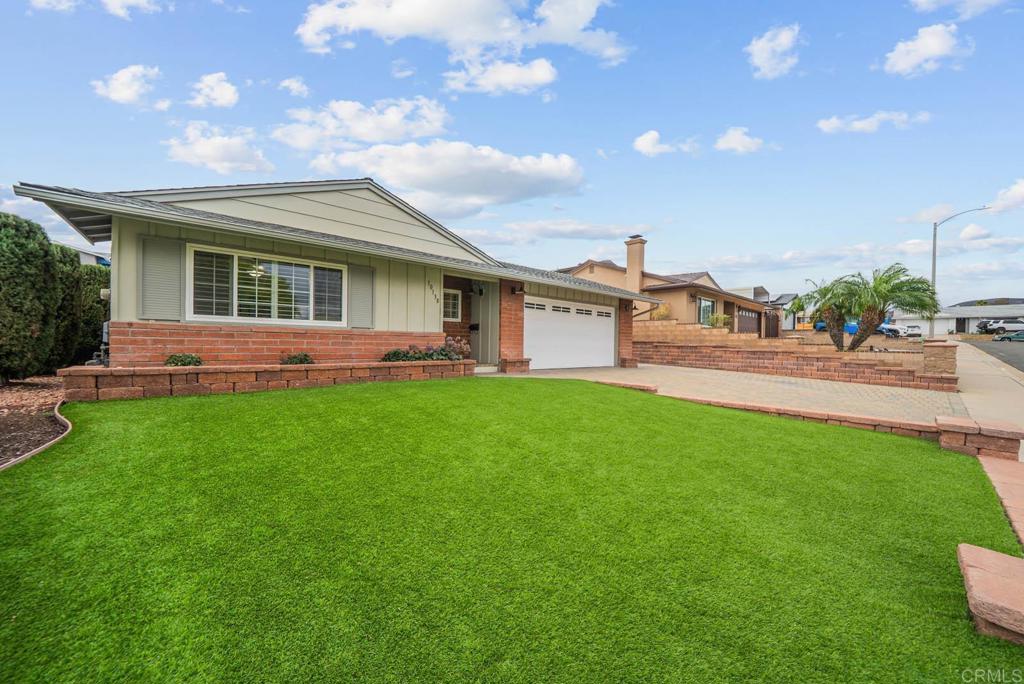 10138 Waynecrest Lane Santee, CA 92071 - Photo 2 of 40 a front view of house with yard and green space