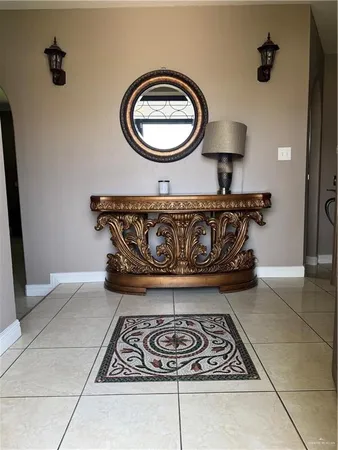 a view of kitchen with a sink and a stove