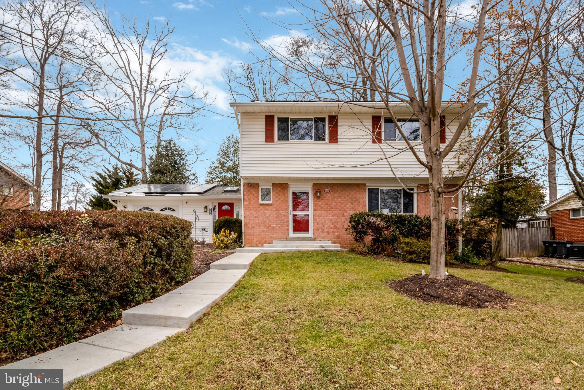 8816 Victoria Road Springfield, VA 22151 - Photo 1 of 76 a view of a house with a yard patio and fire pit