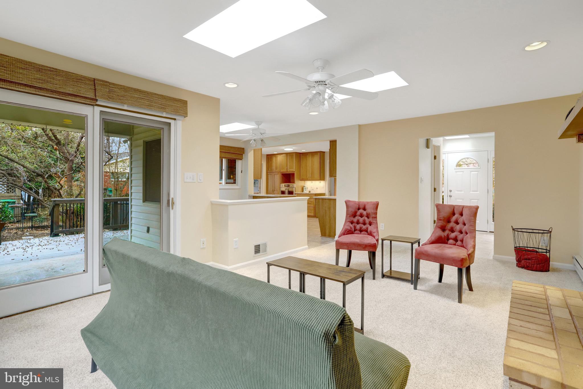 8816 Victoria Road Springfield, VA 22151 - Photo 20 of 76 a living room with furniture and a large window