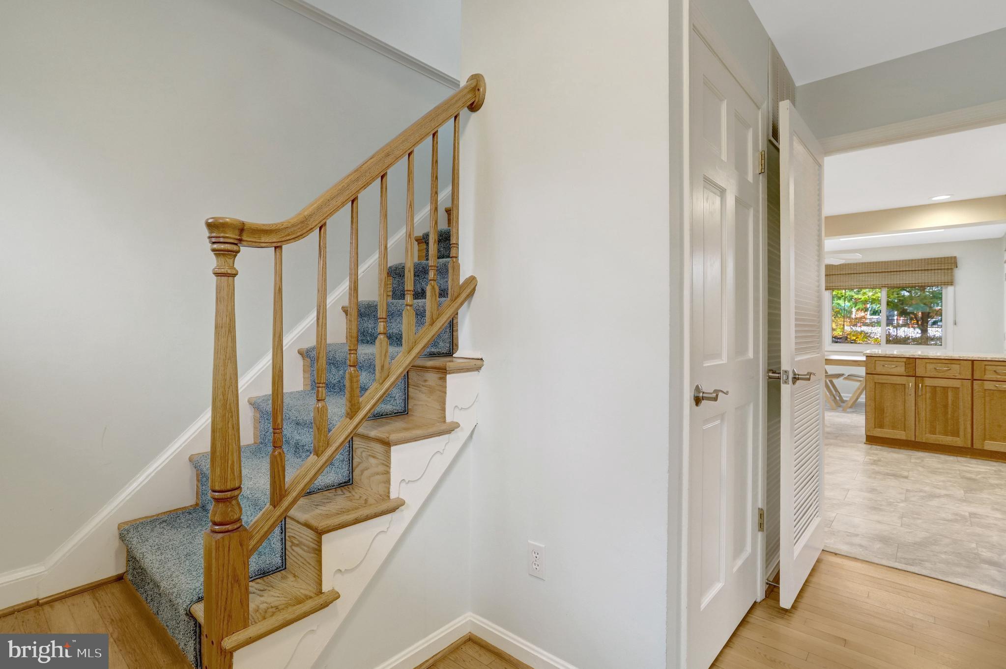 8816 Victoria Road Springfield, VA 22151 - Photo 3 of 76 a view of a hallway with wooden floor and entryway