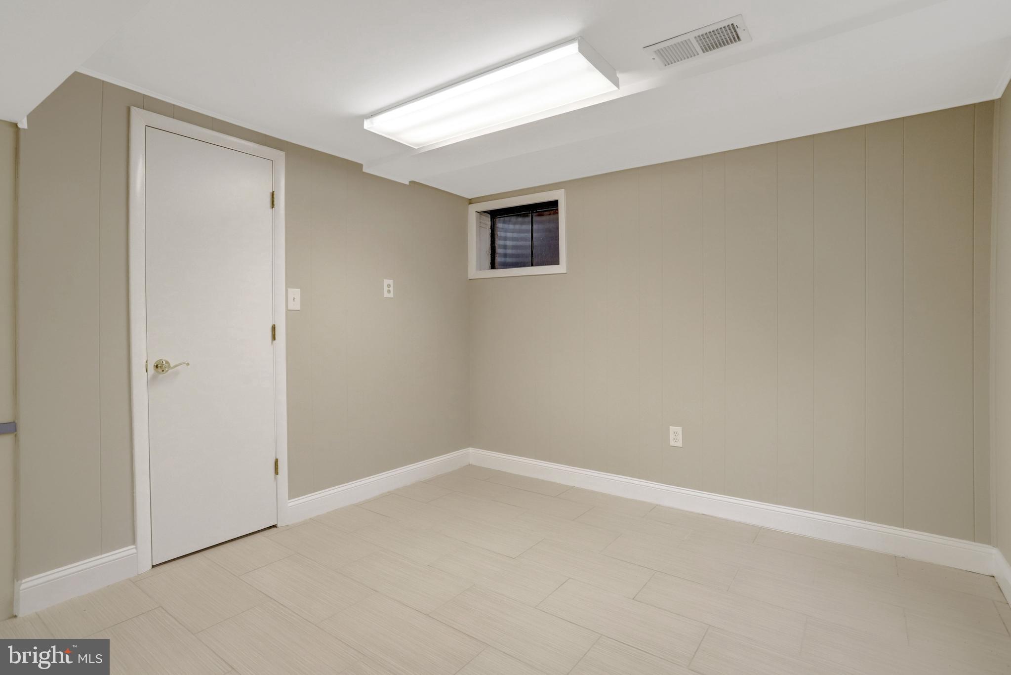 8816 Victoria Road Springfield, VA 22151 - Photo 58 of 76 a view of an empty room