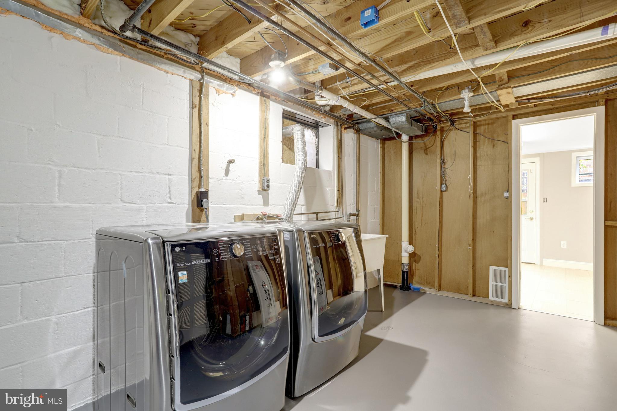 8816 Victoria Road Springfield, VA 22151 - Photo 64 of 76 a view of storage and utility room