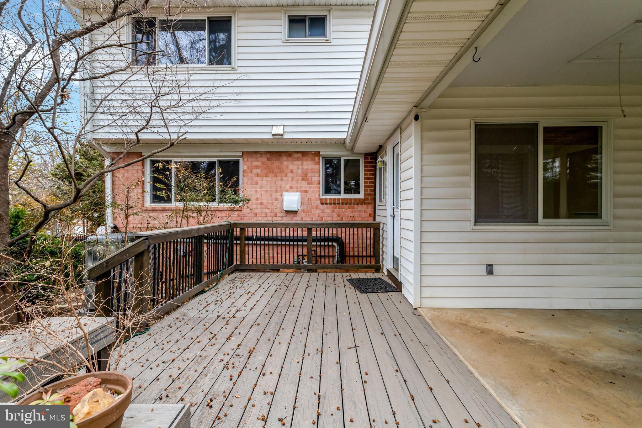 8816 Victoria Road Springfield, VA 22151 - Photo 71 of 76 a view of a house with pool and chairs