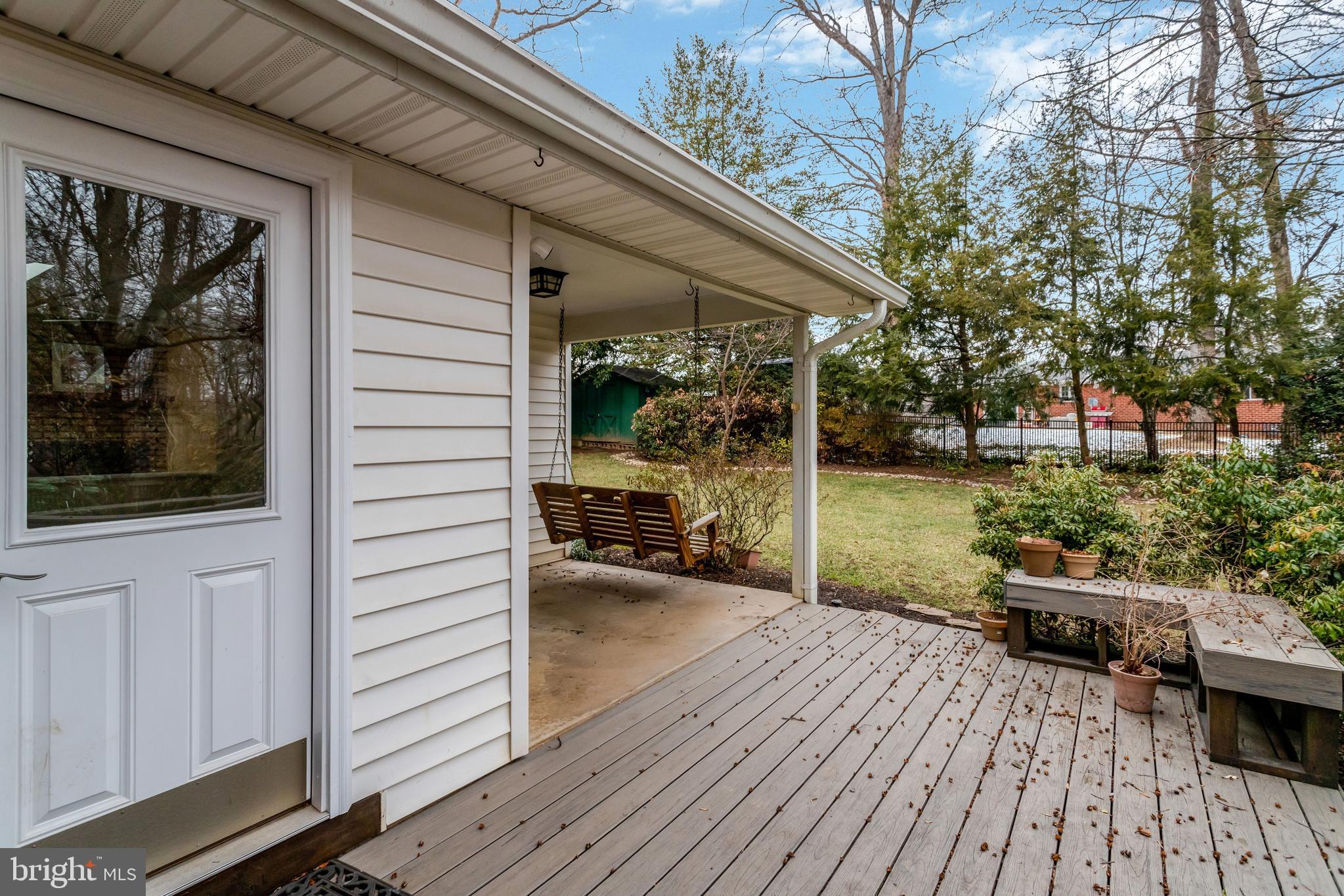 8816 Victoria Road Springfield, VA 22151 - Photo 74 of 76 a view of a house with backyard porch and sitting area