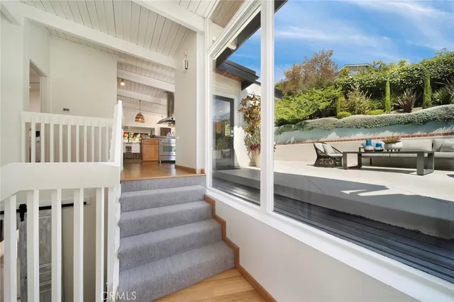 a view of a balcony with car parked