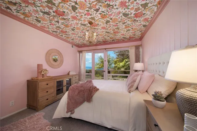 a bed room with a bed and a window