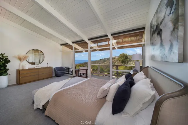 a bed room with a bed and window