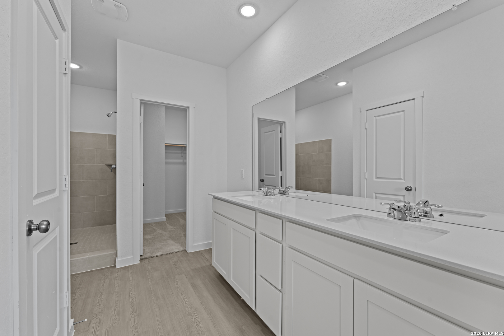 2315 Fort Davis Pass Marion, TX 78124 - Photo 11 of 31 a bathroom with a double vanity sink mirror and double