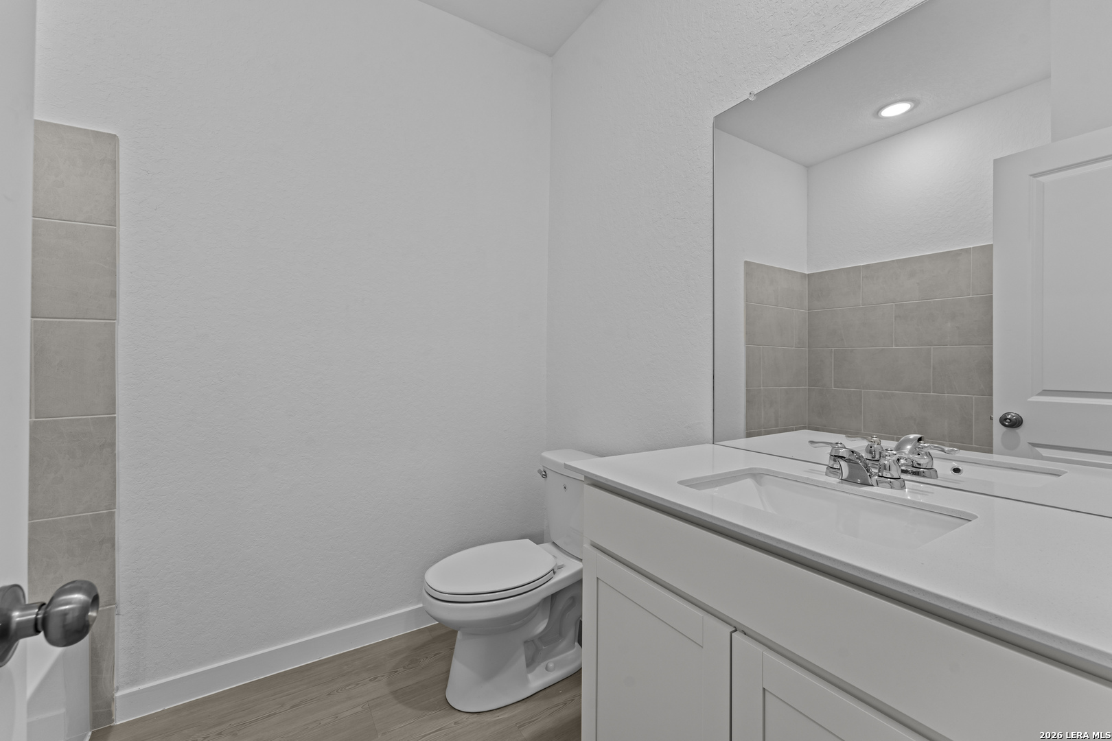 2315 Fort Davis Pass Marion, TX 78124 - Photo 20 of 31 a bathroom with a sink a toilet and mirror