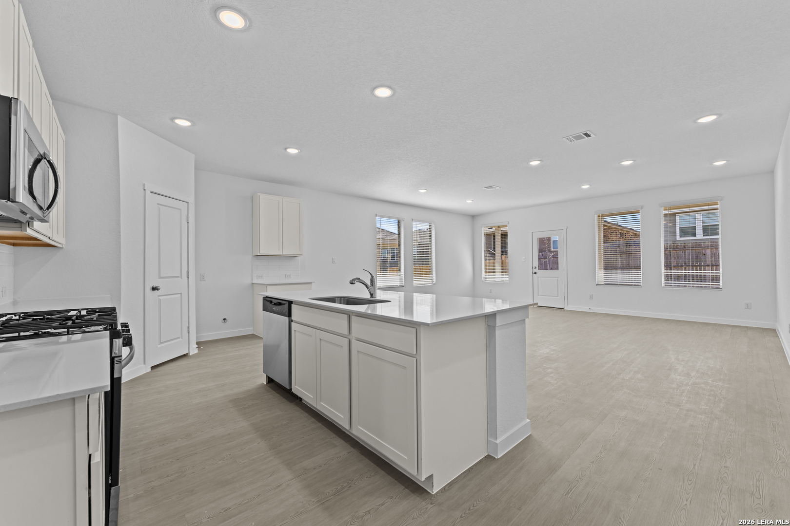 2315 Fort Davis Pass Marion, TX 78124 - Photo 2 of 31 a kitchen with counter top space and windows
