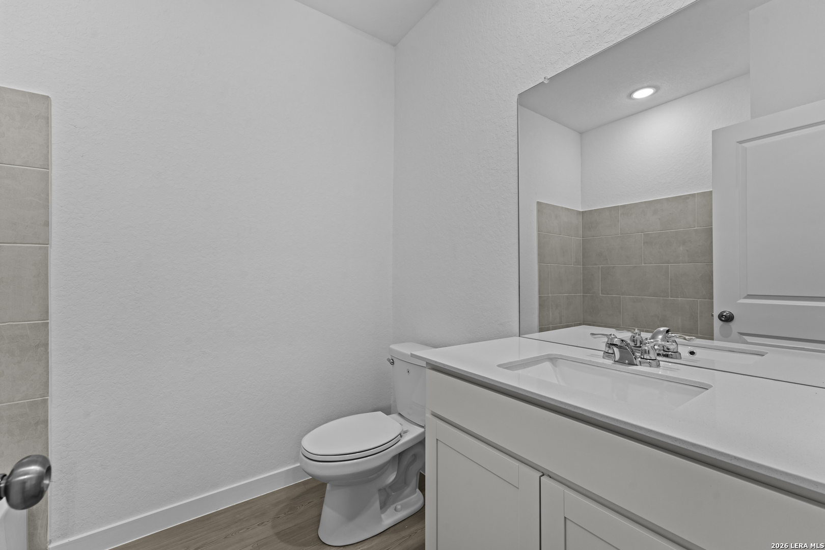 2315 Fort Davis Pass Marion, TX 78124 - Photo 27 of 31 a bathroom with a sink a toilet and mirror
