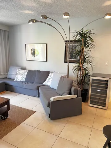 a bedroom with a bed and a cabinets