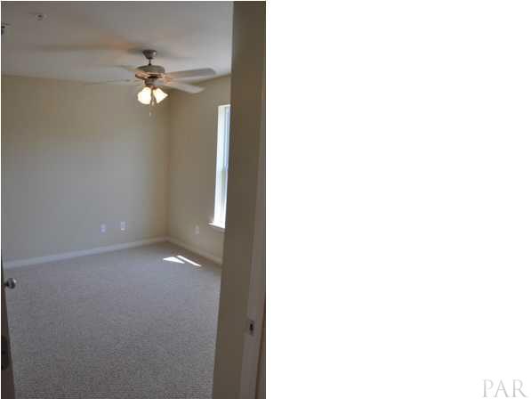 16076 Innerarity Point Road, Unit 16076 Pensacola, FL 32507 - Photo 12 of 17 Downstairs Bedroom off Kitchen / Living Area