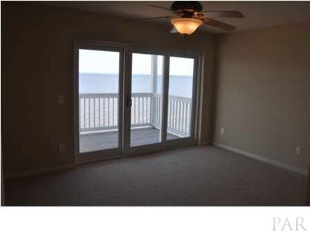 16076 Innerarity Point Road, Unit 16076 Pensacola, FL 32507 - Photo 13 of 17 Master Bedroom with Waterfront Balcony!!