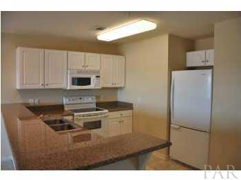 16076 Innerarity Point Road, Unit 16076 Pensacola, FL 32507 - Photo 9 of 17 Kitchen with Granite Countertops