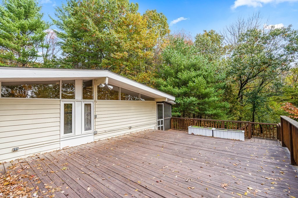 15 Partridge Road Lexington, MA 02420 - Photo 2 of 22 a view of a house with a backyard