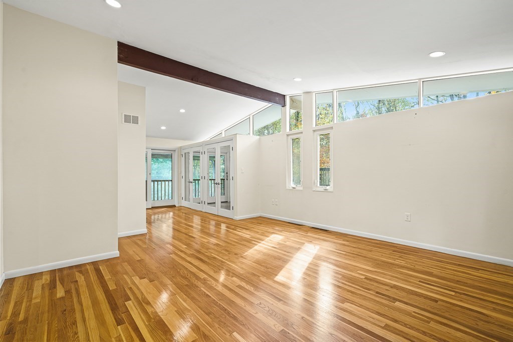 15 Partridge Road Lexington, MA 02420 - Photo 9 of 22 a view of an empty room with wooden floor