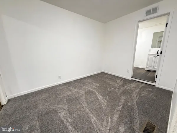 a bathroom with a sink and a shower