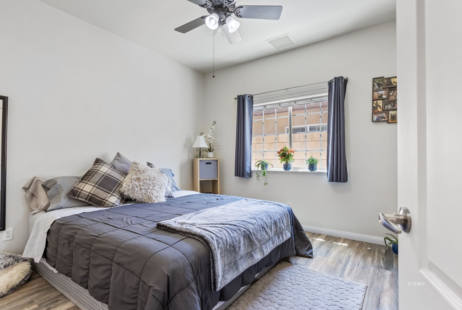 413 Acacia Street Ridgecrest, CA 93555 - Photo 25 of 34 a bedroom with bed and window