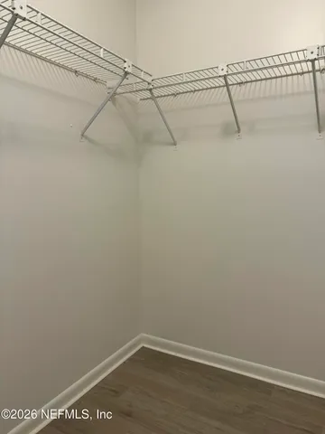 a view of a room with racks on the wall