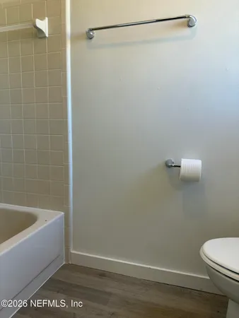 a view of backyard with tree