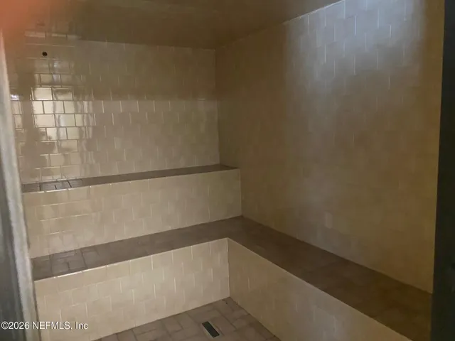 a view of a garden with a tree