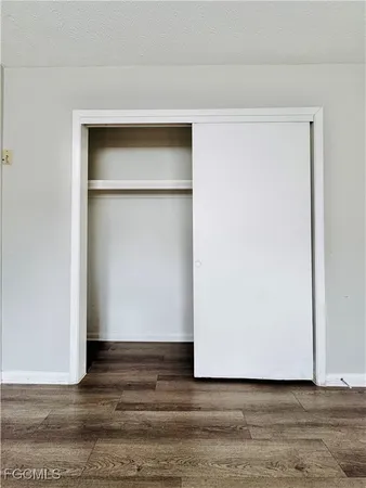 a view of small space with wooden floor