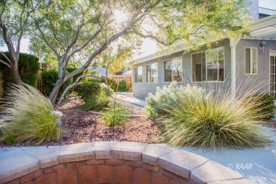 331 West Pilgrim Court Ridgecrest, CA 93555 - Photo 33 of 35 a front view of a house with garden