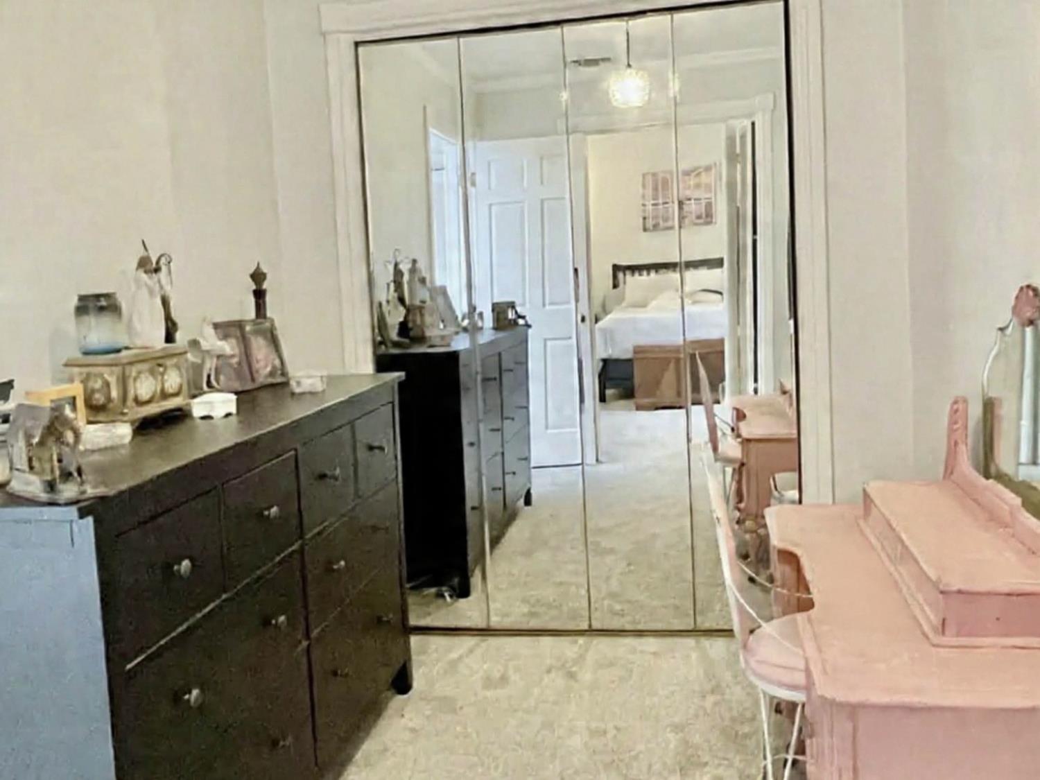 515 Clinton Road Jackson, CA 95642 - Photo 24 of 29 a bathroom with a double vanity sink and a mirror