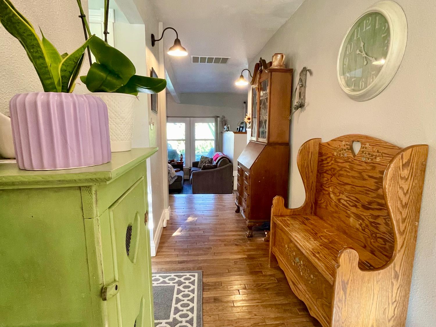 515 Clinton Road Jackson, CA 95642 - Photo 7 of 29 a living room with a couch wooden floor and a table