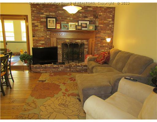 1114 Shamrock Road Charleston, WV 25314 - Photo 10 of 16 Den/Family/Great Room. Sitting room w/woodburning fireplace, part of kitchen.