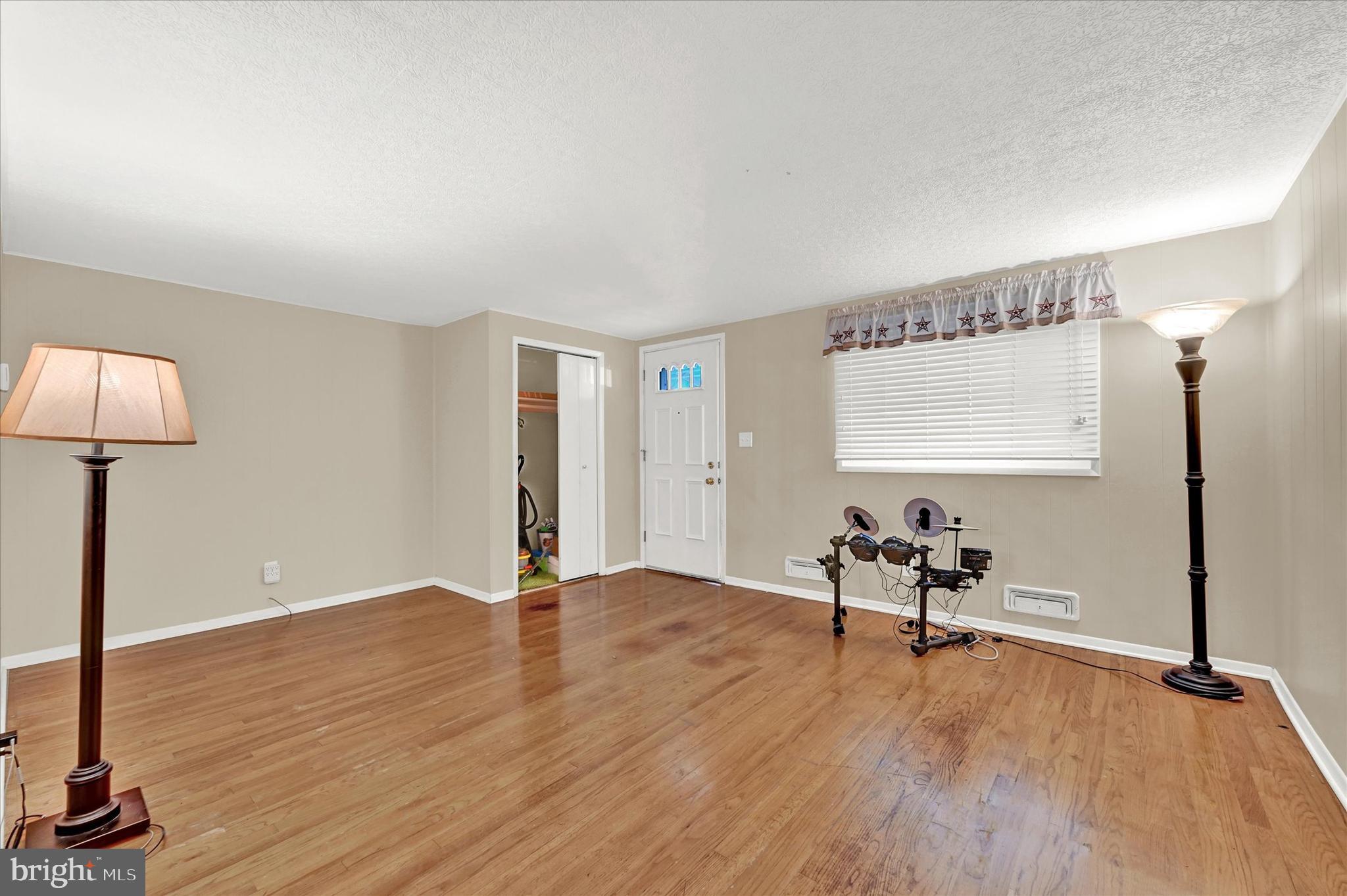 7837 Harold Road Dundalk, MD 21222 - Photo 7 of 24 **Carpet to be installed on main level**