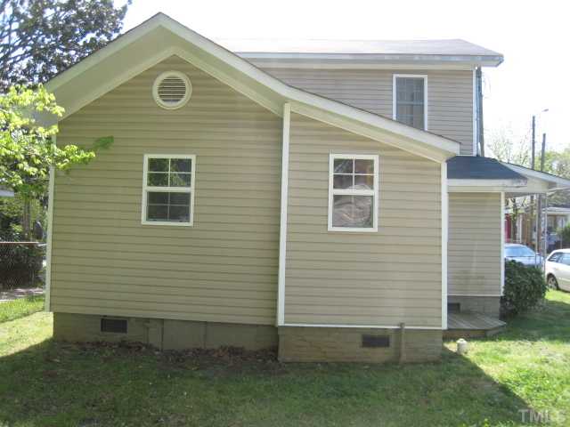 1501 East Lane Street Raleigh, NC 27610 - Photo 3 of 3 a view of a house with a yard