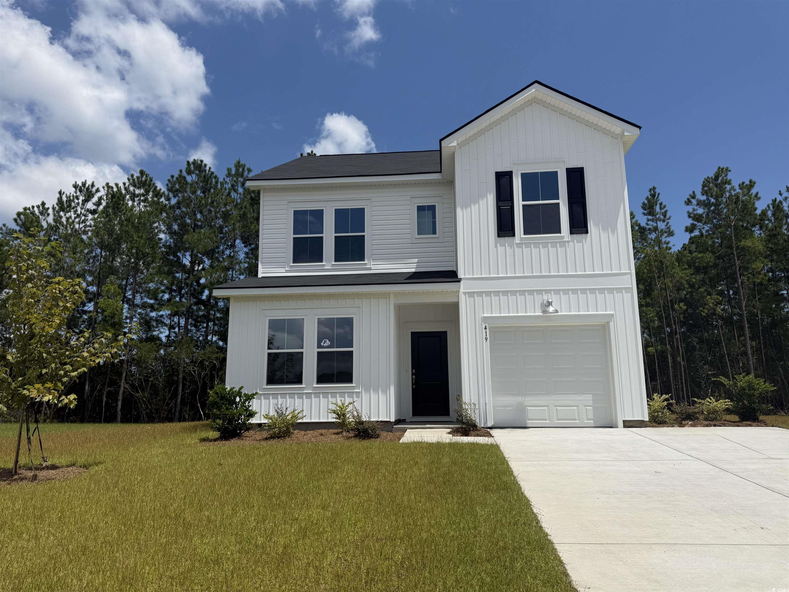 419 Falling Leaf Loop Myrtle Beach, SC 29588 - Photo 1 of 14 Modern farmhouse style home featuring a front yard