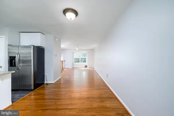 a view of a kitchen with a sink