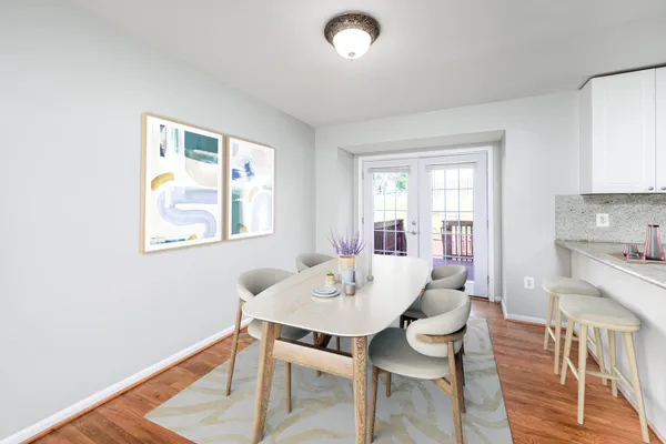 a view of a dining room with furniture