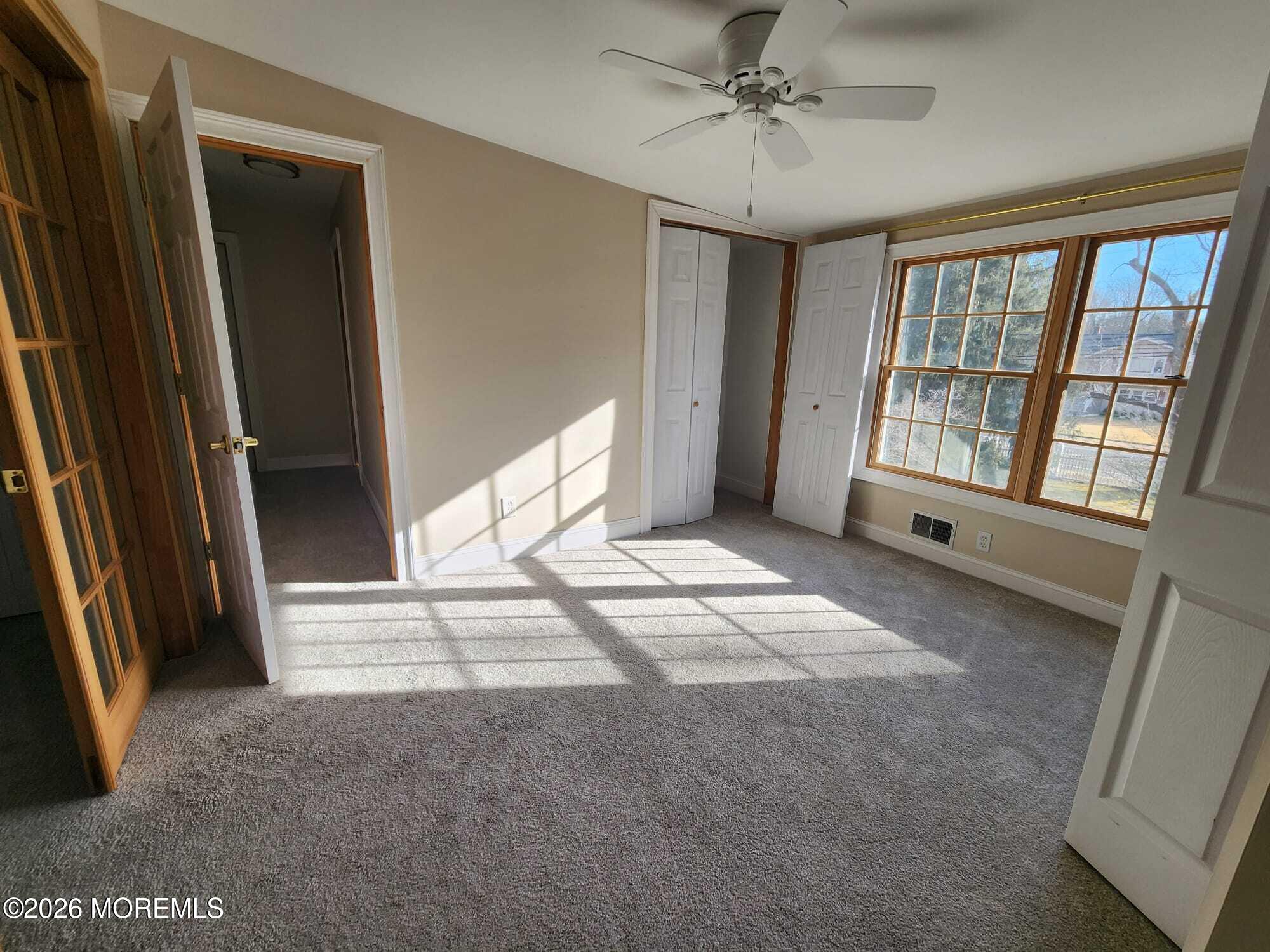 426 Bennetts Mills Road Jackson, NJ 08527 - Photo 12 of 20 a view of an empty room with a window