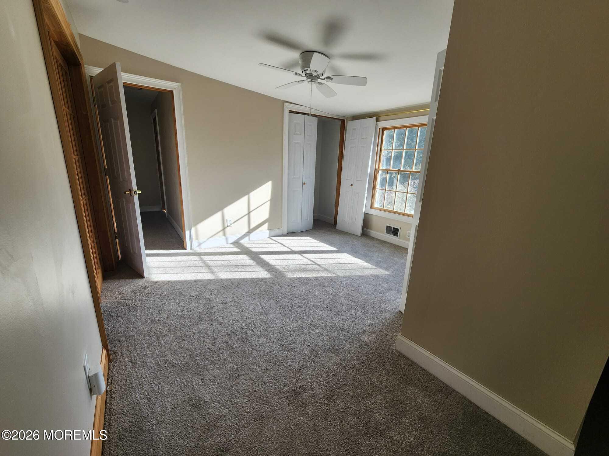 426 Bennetts Mills Road Jackson, NJ 08527 - Photo 16 of 20 a view of an empty room with a window