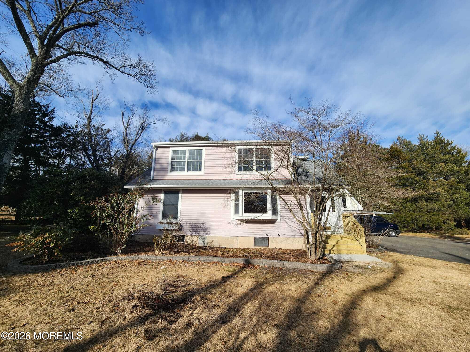 426 Bennetts Mills Road Jackson, NJ 08527 - Photo 2 of 20 a view of a yard in front of a house