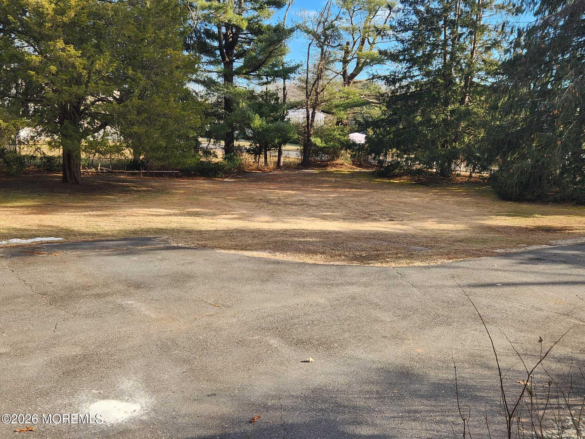 426 Bennetts Mills Road Jackson, NJ 08527 - Photo 3 of 20 a view of dirt field with trees