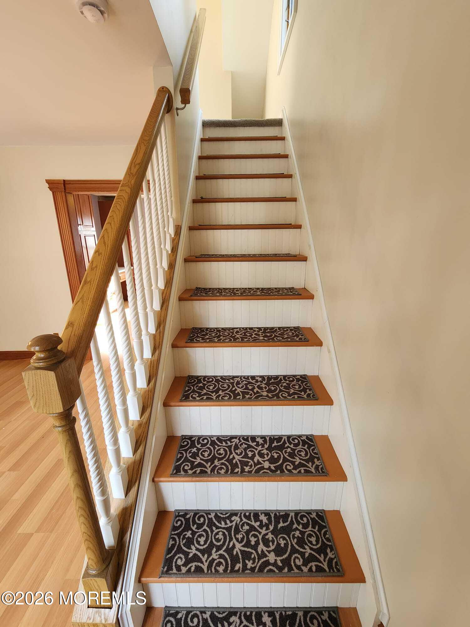 426 Bennetts Mills Road Jackson, NJ 08527 - Photo 8 of 20 a view of staircase with white walls and a rug