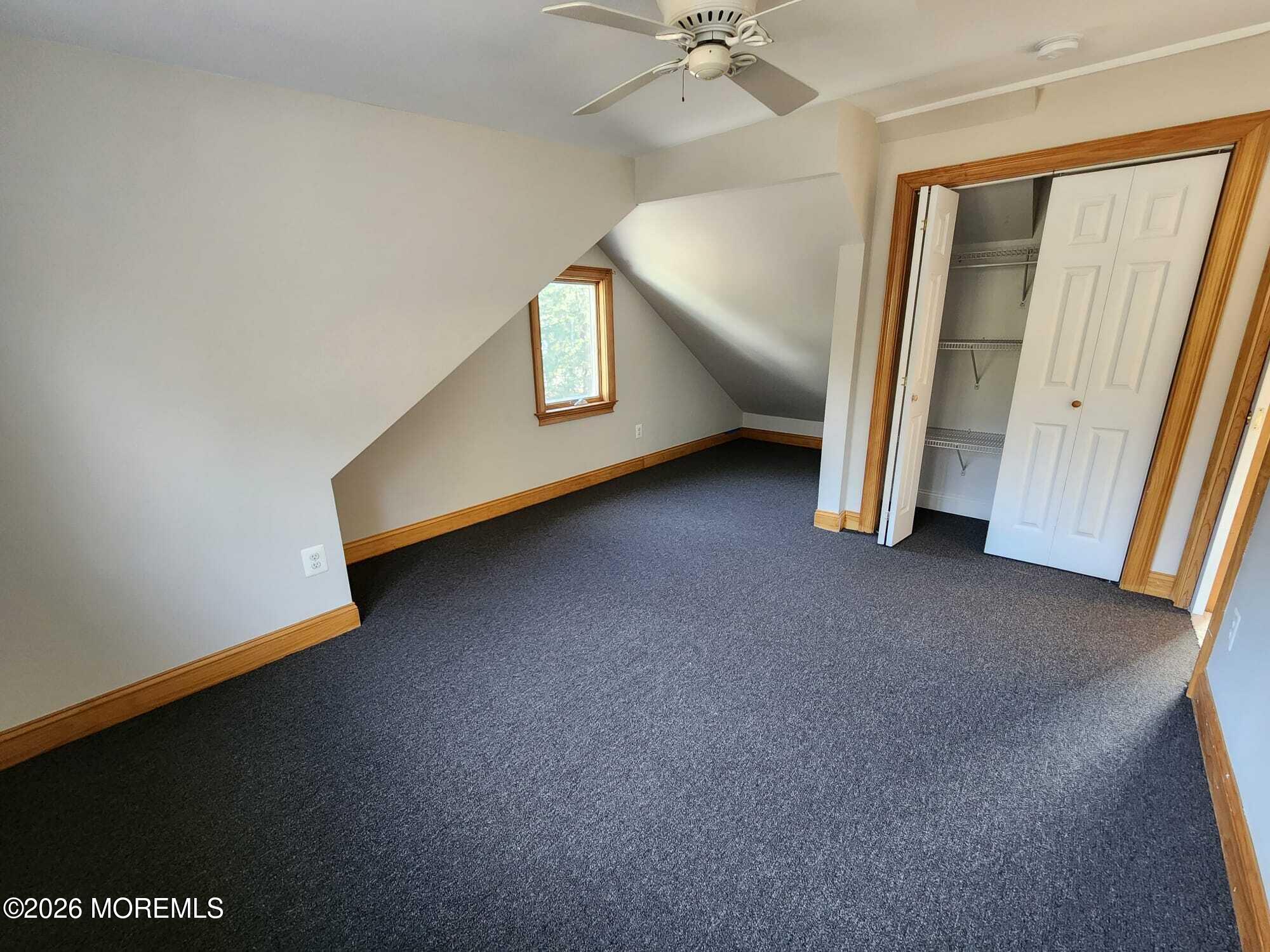 426 Bennetts Mills Road Jackson, NJ 08527 - Photo 10 of 20 wooden floor in an empty room with a window