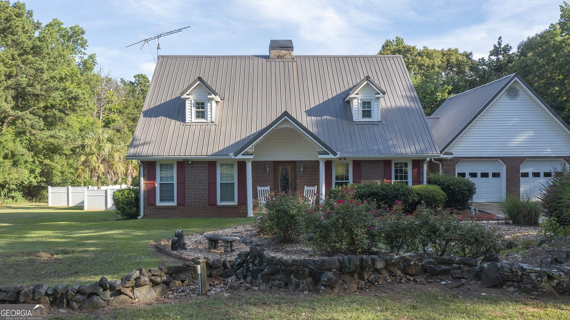 2537 Dames Ferry Road Forsyth, GA 31029 - Photo 1 of 1 a front view of a house with a yard
