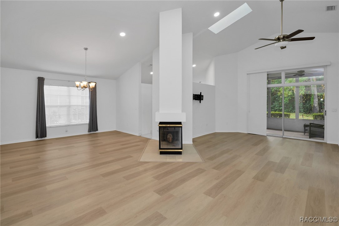 36 Byrsonima Loop Homosassa, FL 34446 - Photo 5 of 54 VIEW FROM FOYER TO DINING ROOM AND LGREAT ROOM