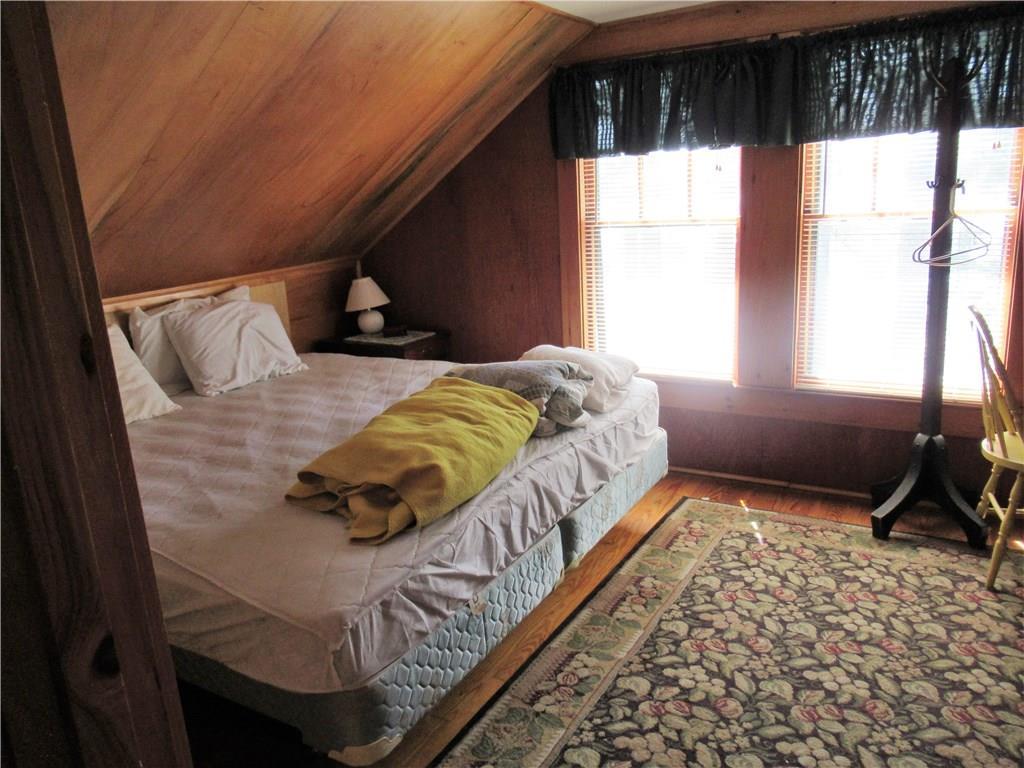 66 Pine Rock Road Naples, ME 04055 - Photo 18 of 27 Upstairs bedroom with lake view.