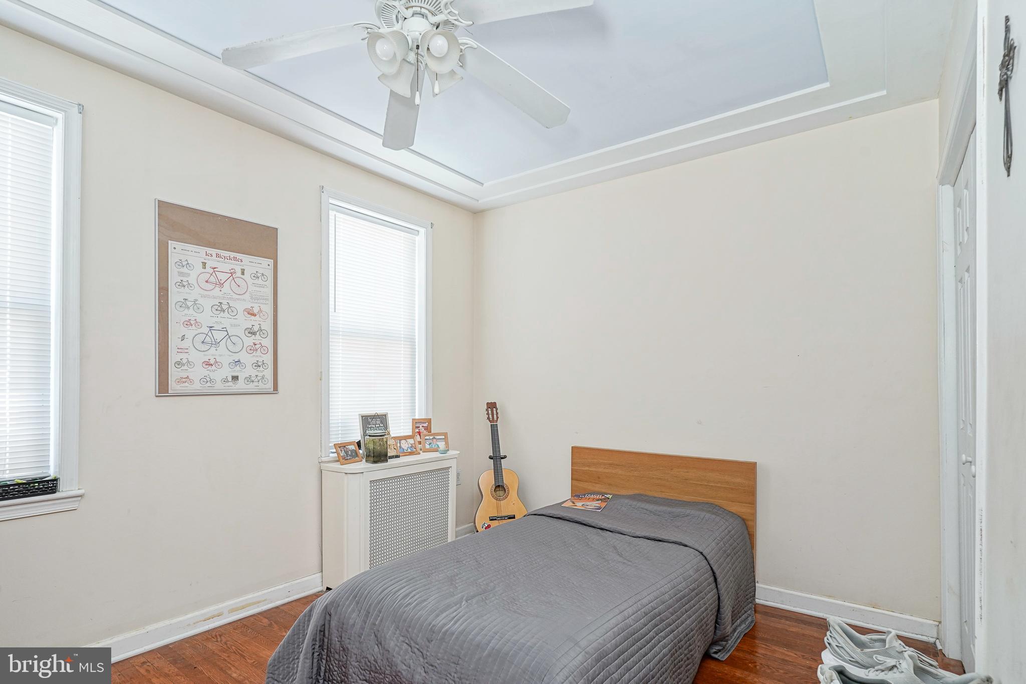 1919 Lansing Street Philadelphia, PA 19111 - Photo 12 of 22 a bedroom with a bed and a window in it