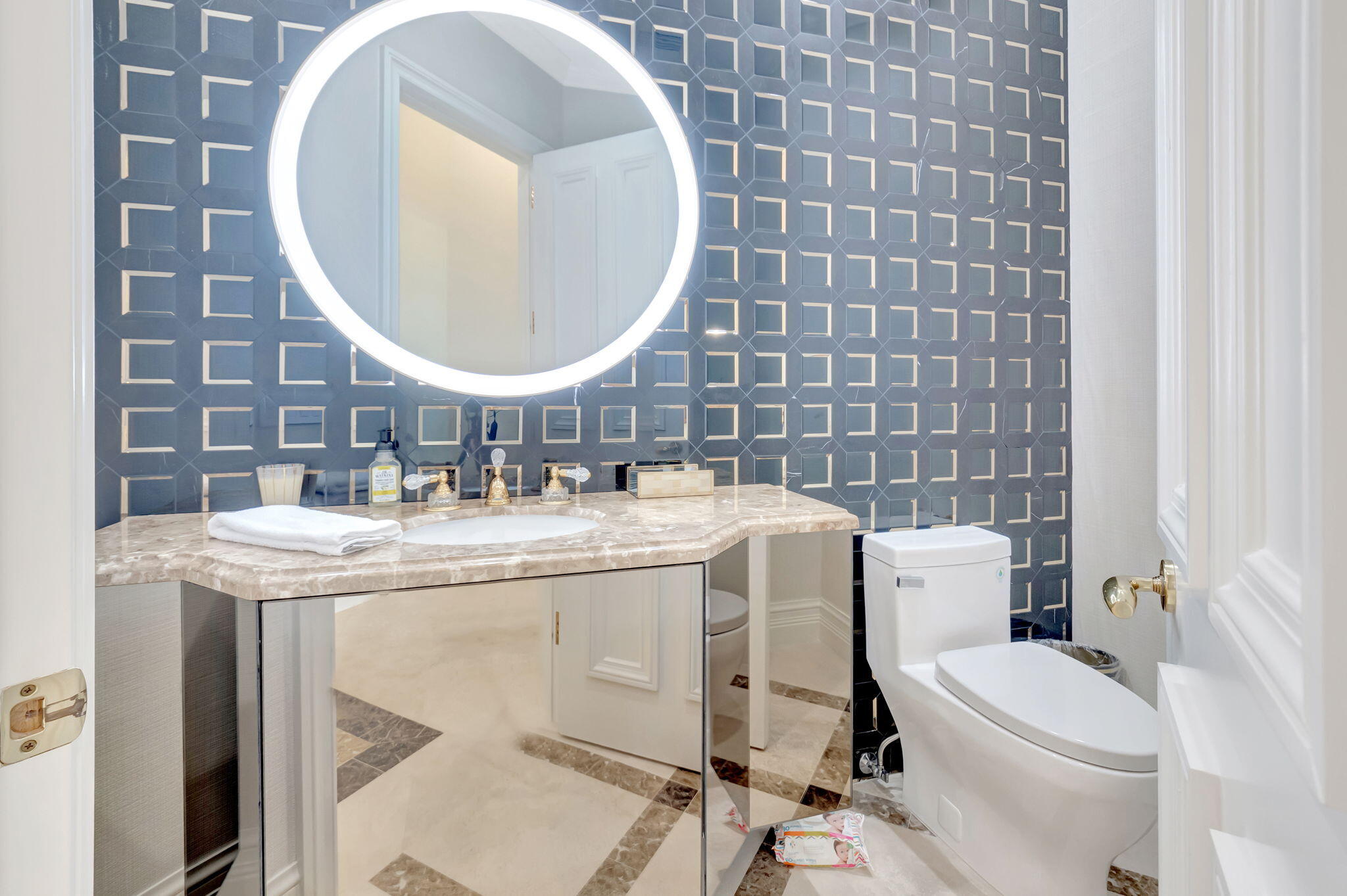 7090 Ayrshire Lane Boca Raton, FL 33496 - Photo 11 of 48 a bathroom with a sink a toilet and a mirror