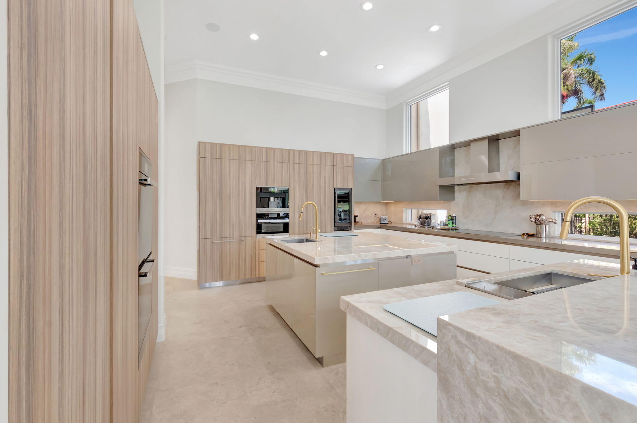 7090 Ayrshire Lane Boca Raton, FL 33496 - Photo 16 of 48 a kitchen with stainless steel appliances granite countertop a sink a stove and a refrigerator